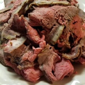 Cider and Chili Marinated Eye of Round Roast sliced deli-style for roast beef sandwiches