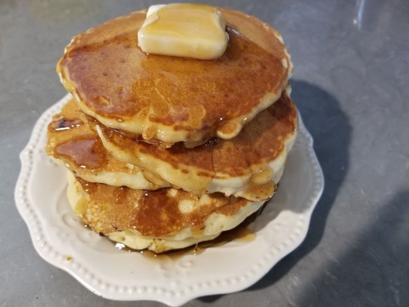 Heart Healthy Buttermilk Pancakes with Butter and Syrup.