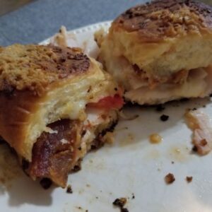 Hot Brown Party Rolls on a white plate.